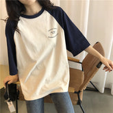 Camisa de manga raglán con letras y bolsillo suelto